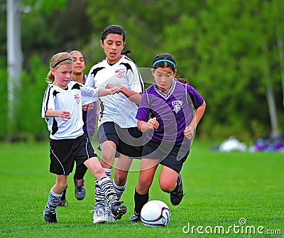 Girls Youth soccer kick
