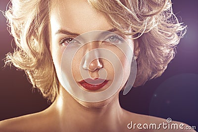 Glamour fashion shine portrait of beautiful curly woman