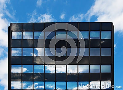 Glass architecture and reflection of sky und cloud