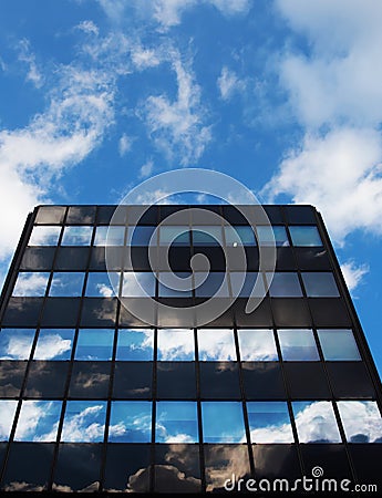 Glass architecture and reflection of the sky und cloud