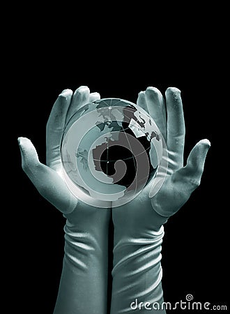 Glass globe in hand