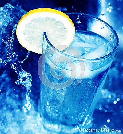 Glass of water with lemon slice 3
