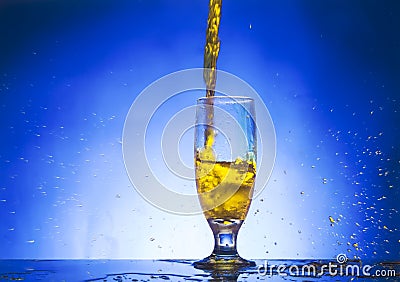 Glass withe yellow liquid