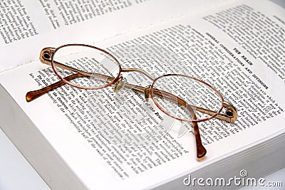 Glasses on a medical book