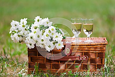 Glasses of wine and flowers