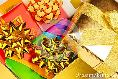 Gold box with gifts inside