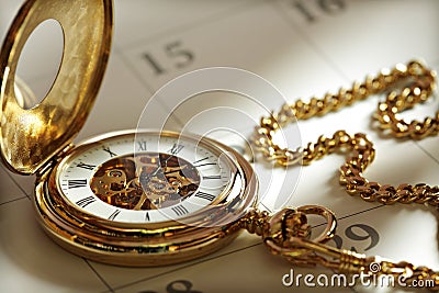Gold Pocket Watch And Calendar Stock Photography - Image: 14075752