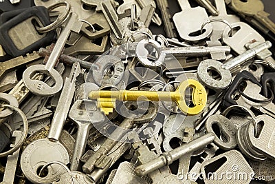 Gold skeleton key and old metal keys