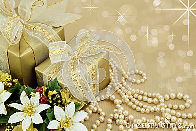 Gold wrapped presents with pearls and flowers