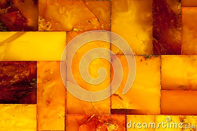 Golden amber mosaic as background or texture. Gem.