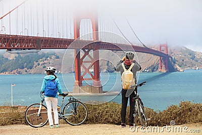 Golden gate bridge - biking couple sightseeing