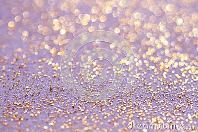 Golden glitter sparkles dust background