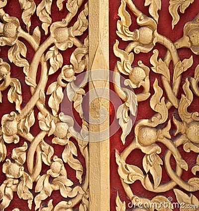 Golden lotus pattern on temple wall