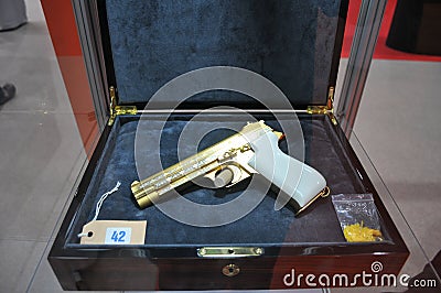 Golden Pistol Display in Abu Dhabi International Hunting and Equestrian Exhibition 2013