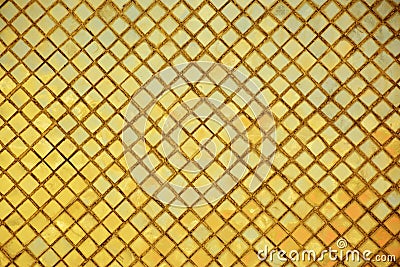 Golden tiles mosaic background.