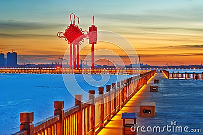 The golden wooden trestle and chinese knot sunset