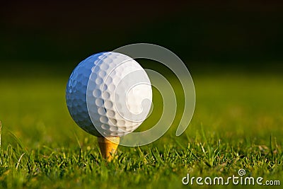 Golf Ball on tee close up