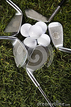 Golf ball on tee with club