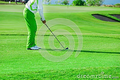 Golf club. Man playing golf