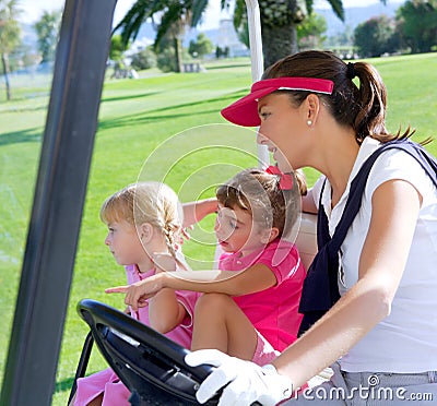 Golf course family mother and daughters in buggy