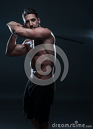 Gorgeous Shirtless Muscled Man Holding A Sword Stock Photo ...