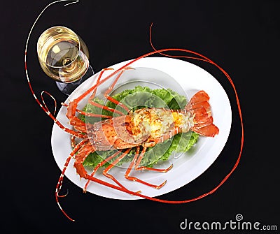 Gourmet lobster dinner with white wine