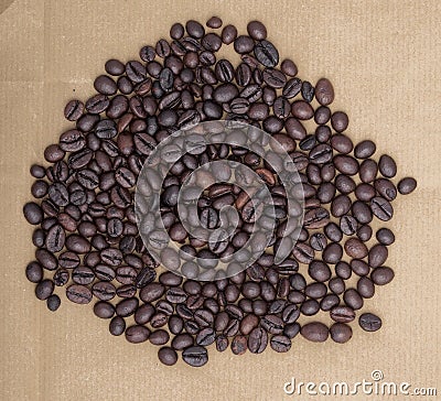 Grains of coffee on wrapping paper