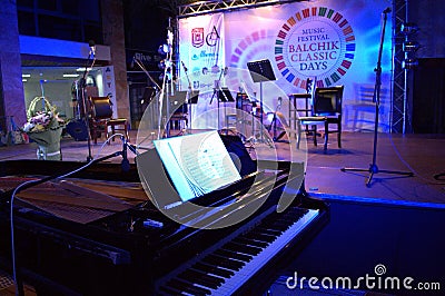 Grand piano at concert stage