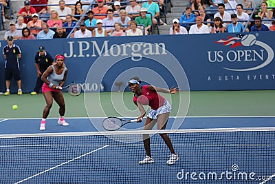 Grand Slam champions Serena Williams and Venus Williams during doubles match at US Open 2014