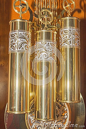 Grandfather clock brass weights pulleys illuminated