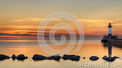 Great Lake Lighthouse Sunrise with Rocks