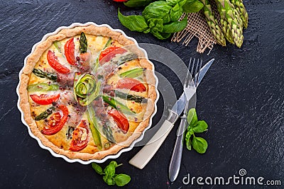 Green asparagi Tart with eggs and tomato