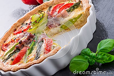 Green asparagi Tart with eggs and tomato