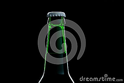 Green bottle beer close-up over black