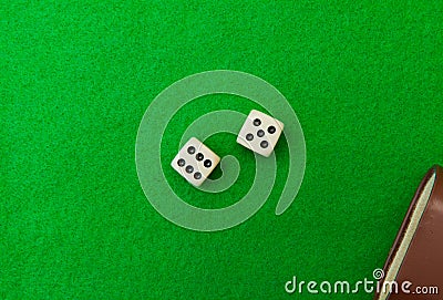 Green casino table with dice