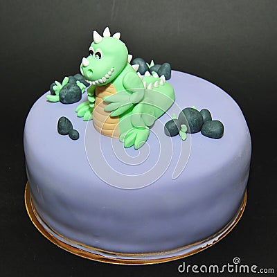 Green dinosaur fondant birthday cake