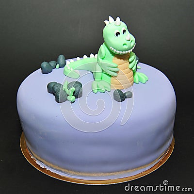 Green dinosaur fondant birthday cake