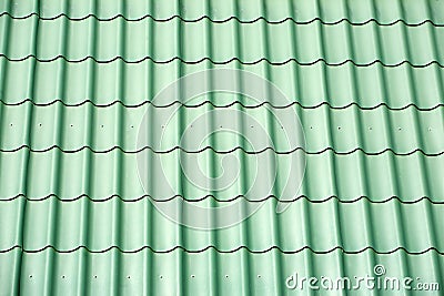 Green metal tile house roof as texture