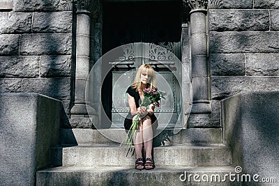 Grief: Woman Sitting on Mausoleum Steps