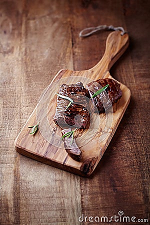 Grilled Beef Steak on a Chopping Board