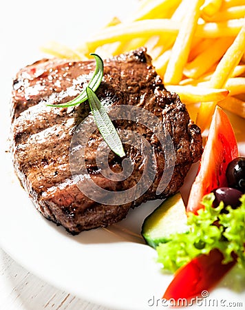 Grilled beef steak with french fries