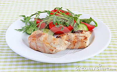 Grilled chicken fillet with salad