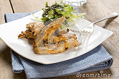 Grilled chicken strips with side salad