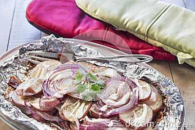 Grilled seasoned red potatoes and onions with ranch dressing