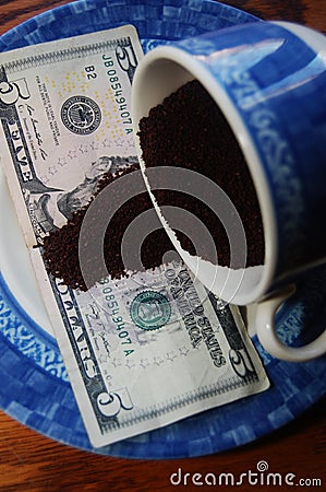 Ground coffee beans on US dollar