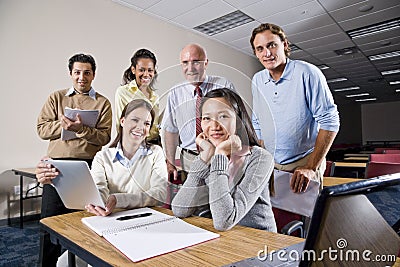 Group of college students and teacher in class
