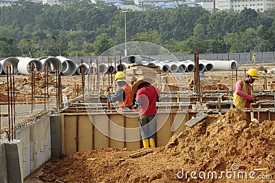 Group of construction Workers Fabricating Reinforcement Bar