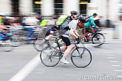 Group of cyclists in the city in motion blur