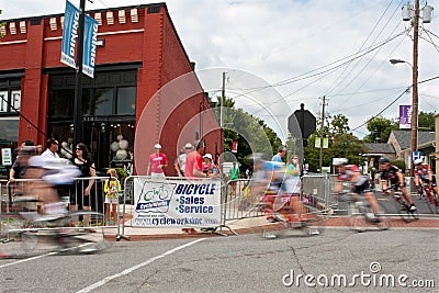 Group Of Cyclists Motion Blur In Turn Of Bike Race