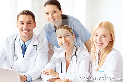 Group of doctors with laptop computer